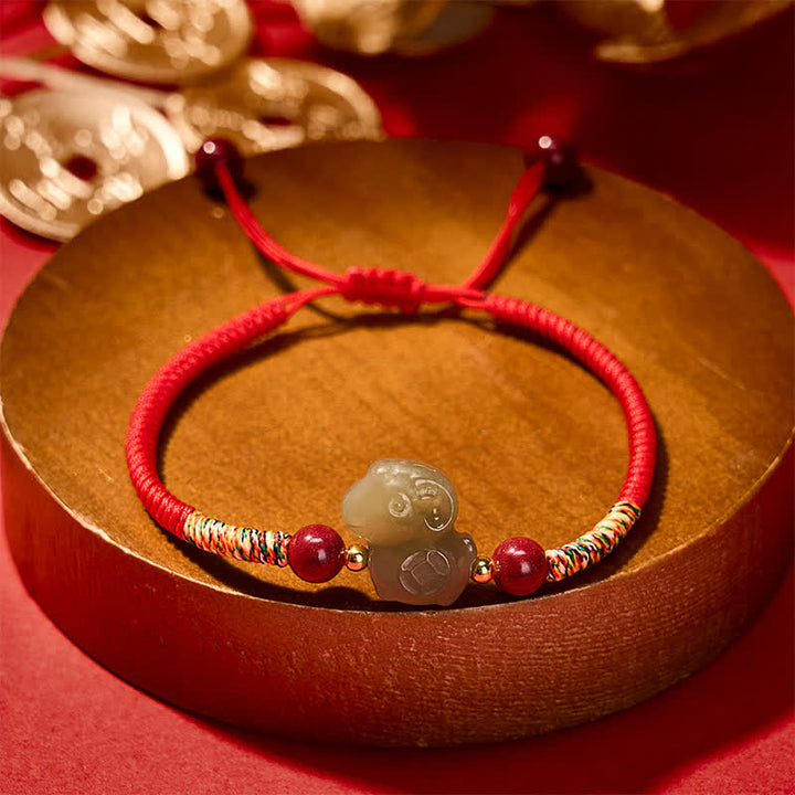 Buddha Stones Pulsera de hilo trenzado con dije de cabra de jade Hetian del Año de la Cabra y cinabrio. - image 2
