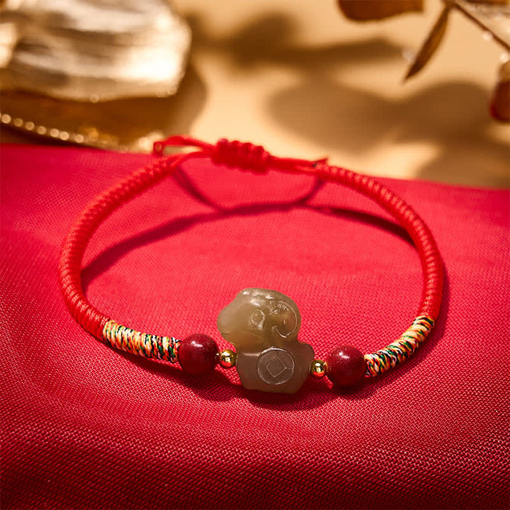 Buddha Stones Pulsera de hilo trenzado con dije de cabra de jade Hetian del Año de la Cabra y cinabrio. - image 1