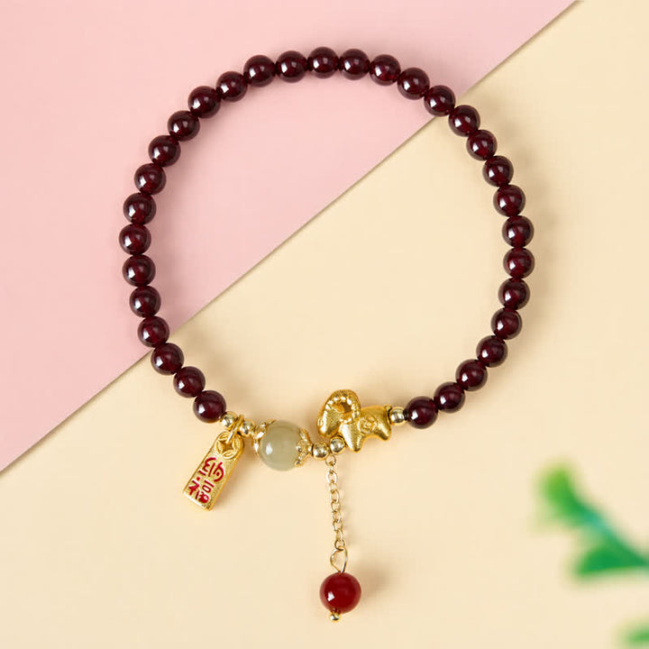 Buddha Stones Pulsera de protección con monedas de personajes de oveja linda y granate del año de la cabra, Granate, Cordero Fu - image 10