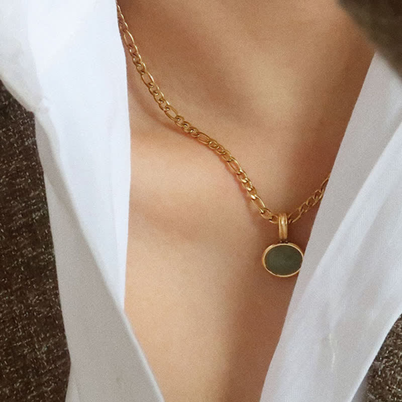 Colgante de collar de acero de titanio de fuerza turquesa ovalada