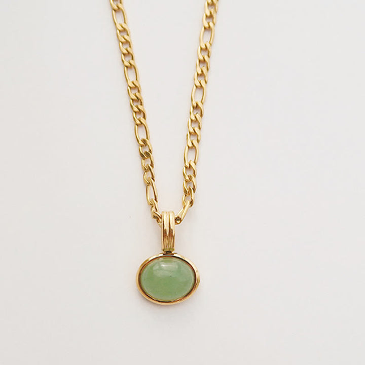 Colgante de collar de acero de titanio de fuerza turquesa ovalada