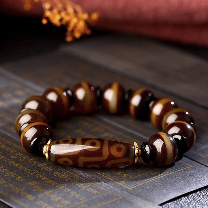 Pulsera de bendiciones de riqueza de ágata con cuentas Dzi de nueve ojos naturales tibetanas de Buddha Stones