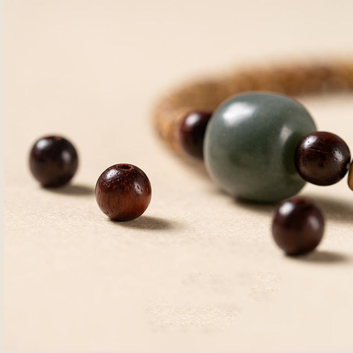 Pulsera de sabiduría de sándalo rojo con hojas pequeñas y semillas de Bodhi de Buddha Stones