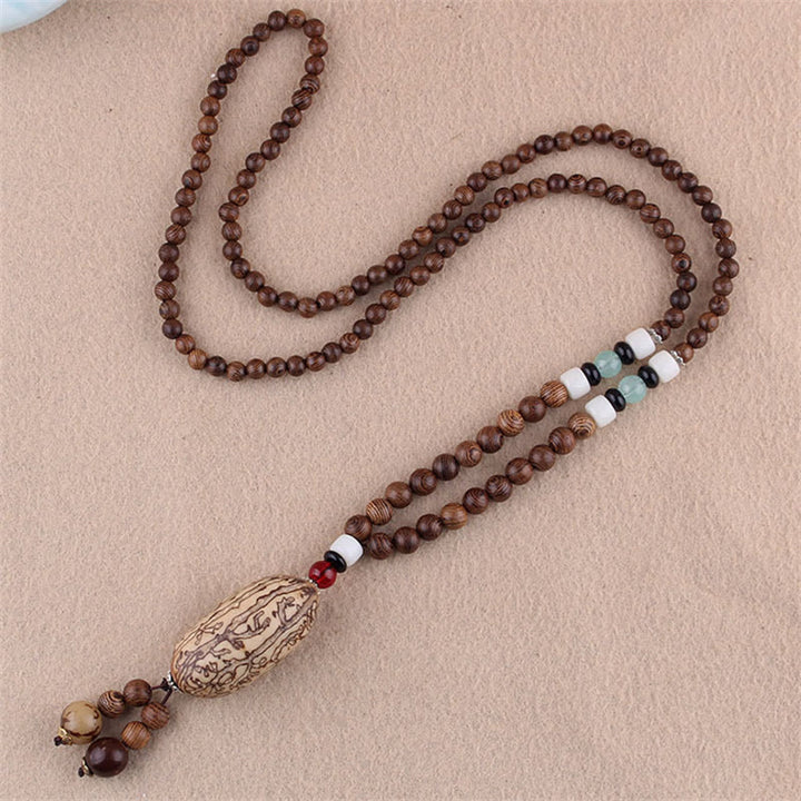 Colgante de collar de protección de elefante de ágata de semilla Bodhi de madera de wengué tibetano con Buddha Stones