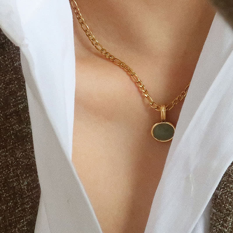 Colgante de collar de acero de titanio de fuerza turquesa ovalada