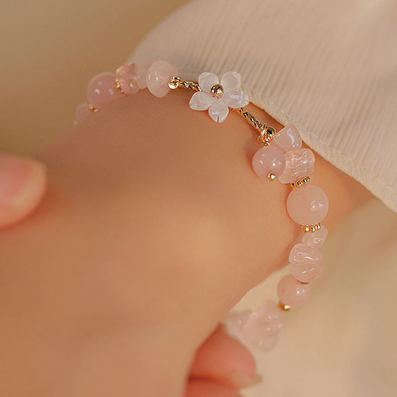 Pulsera de amor con flor de cristal rosa natural chapada en oro de 14 quilates con Buddha Stones