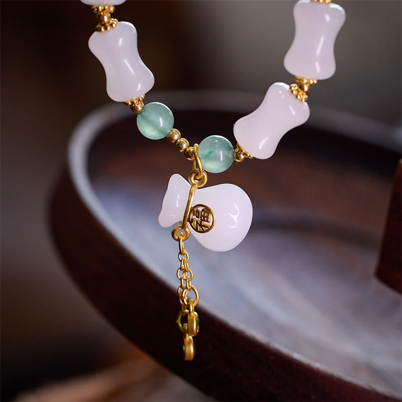 Buddha Stones Natural blanco dorado seda Jade bambú patrón riqueza suerte bolsa Fu personaje pulsera