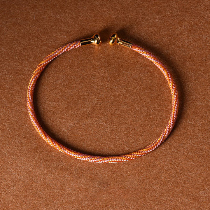 Pulsera de cuerda trenzada de la suerte hecha a mano con diseño simple de Buddha Stones
