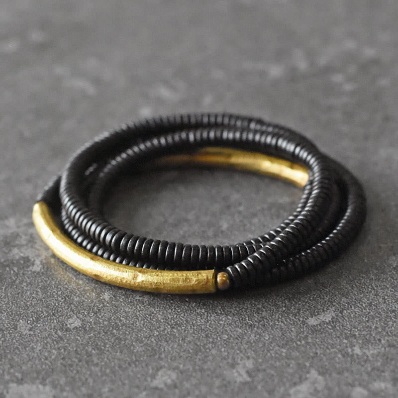 Pulsera multicapa con Buddha Stones, madera de ébano, latón y cobre - 17-17,5 cm - image 0