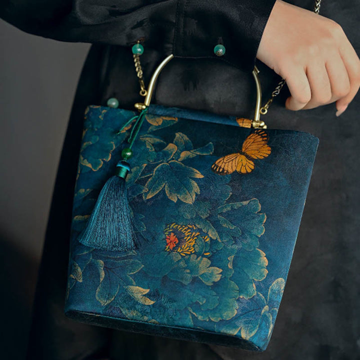Bolso bandolera con cadena de metal, diseño de Buddha Stones y mariposas