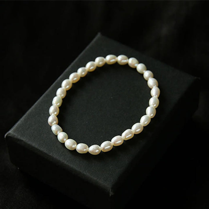 Pulsera con cuentas curativas de perlas naturales de Buddha Stones