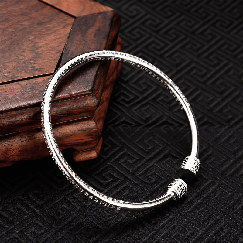 Brazalete de cobre blanco con diseño de esvástica grabado en Sutra del corazón