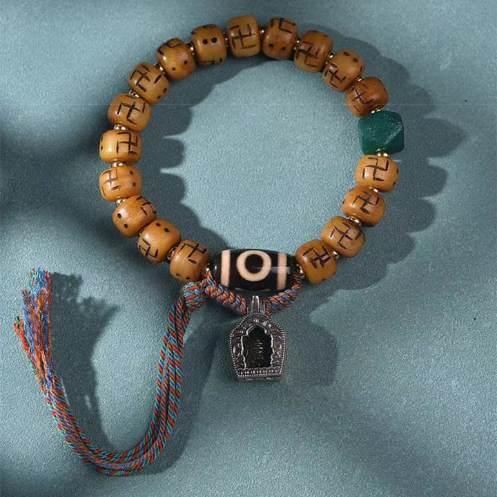 Buddha Stones, hueso de camello tibetano Natural, esvástica, cuentas Dzi, amuleto de Buda Shankha, Kirtimukha, pulsera con borla de protección de la suerte
