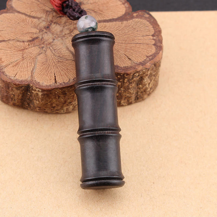 Buddha Stones madera de ébano patrón de bambú Ghau caja de oración collar de paz colgante