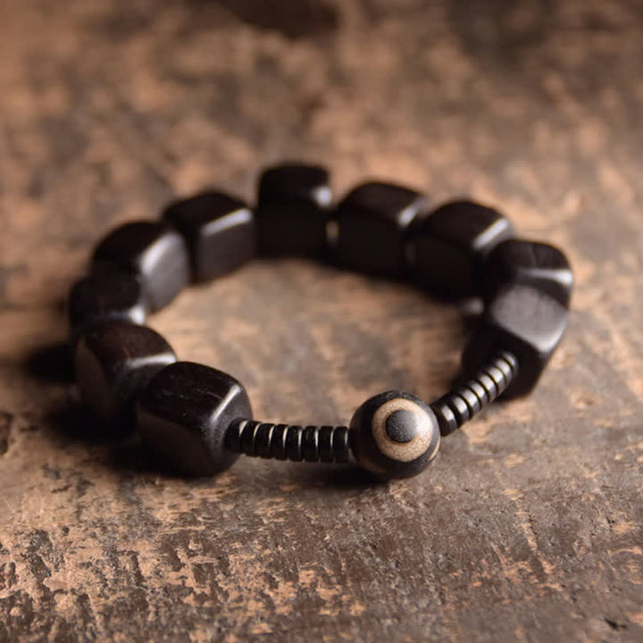 Pulsera resistente con cuentas Dzi de madera de ébano tibetano con Buddha Stones