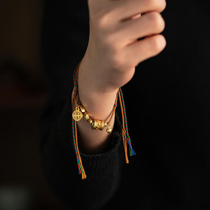 Pulsera de cuerda de fuerza de protección de rueda de oración Om Mani Padme Hum hecha a mano tibetana con Buddha Stones