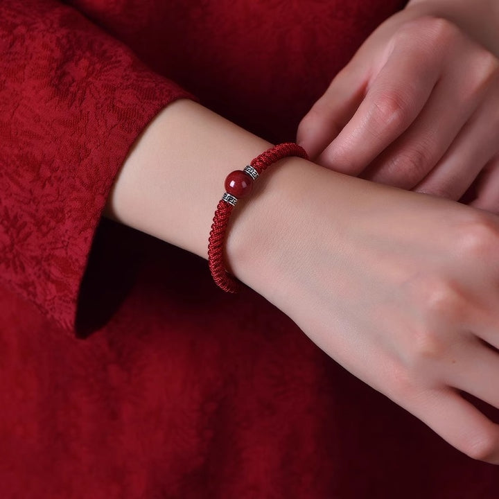 Pulsera de hilo trenzado hecha a mano con cuentas de cinabrio natural de plata de ley 925 con Buddha Stones