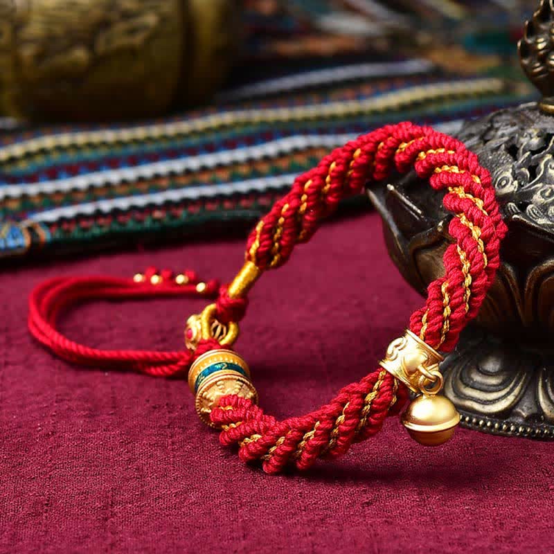 Pulsera de cuerda trenzada con dije de campana y rueda de oración Thangka de protección de la suerte hecha a mano tibetana