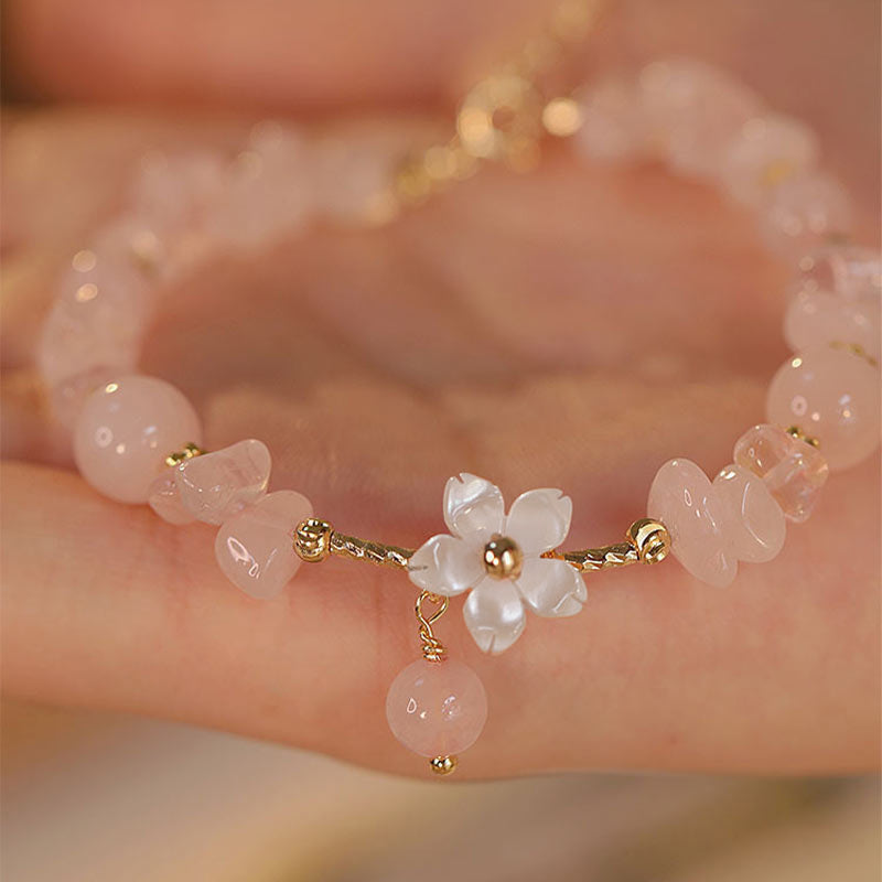 Pulsera de amor con flor de cristal rosa natural chapada en oro de 14 quilates con Buddha Stones