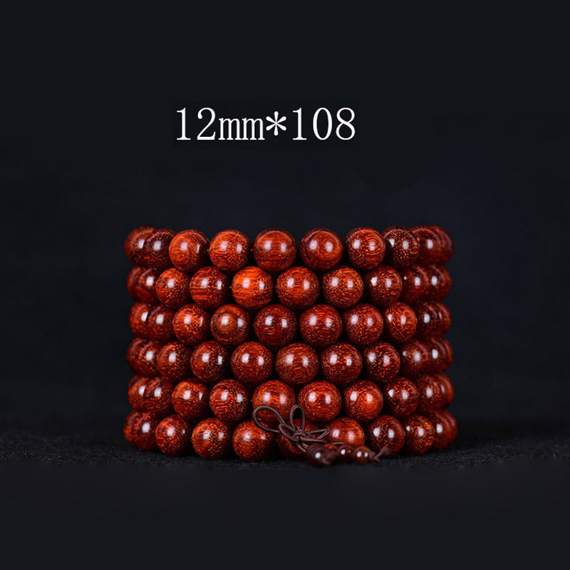 Pulsera de equilibrio de sándalo rojo con hoja pequeña tibetana de Buddha Stones