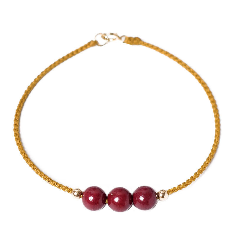 Pulsera trenzada con cadena de bendición de cinabrio natural chapada en oro de 14 quilates con Buddha Stones