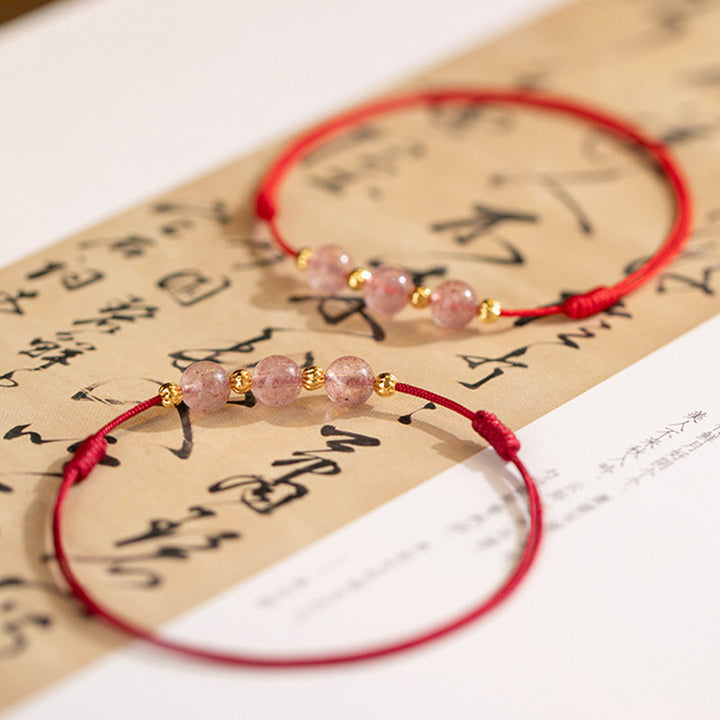 Tobillera con hilo rojo de la suerte con cuentas de cristal de fresa y piedras de Buddha Stones