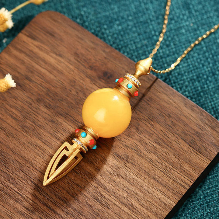 Colgante de collar de ansiedad transparente Dorje Vajra de ámbar chapado en oro de 24 quilates