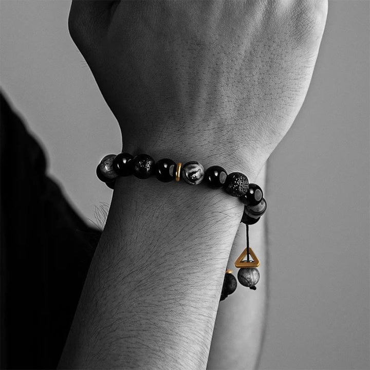 Pulsera de fuerza Yin Yang de piedra de roca de lava de obsidiana negra con Buddha Stones