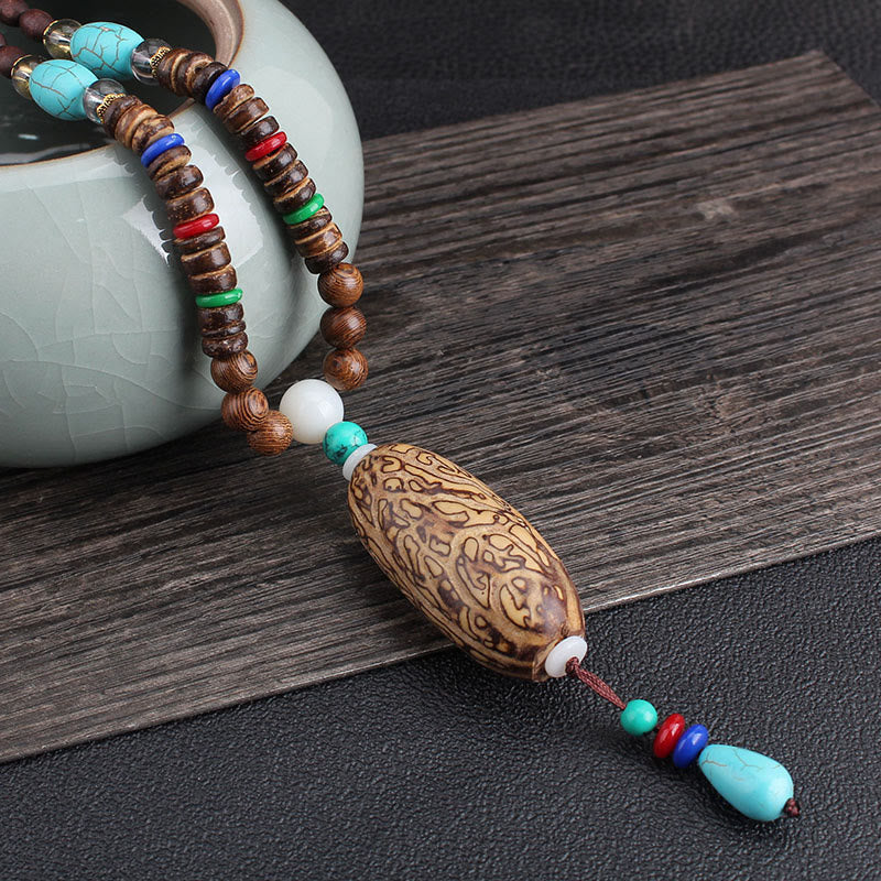 Buddha Stones, colgante de collar de paz de equilibrio de ágata de semilla Bodhi de madera de wengué tibetano