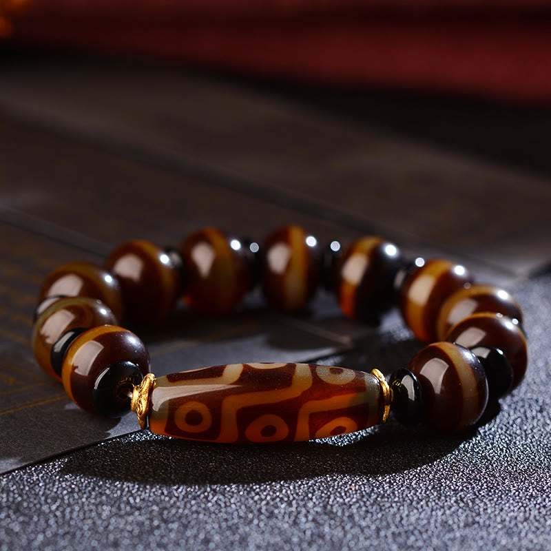 Pulsera de bendiciones de riqueza de ágata con cuentas Dzi de nueve ojos naturales tibetanas de Buddha Stones