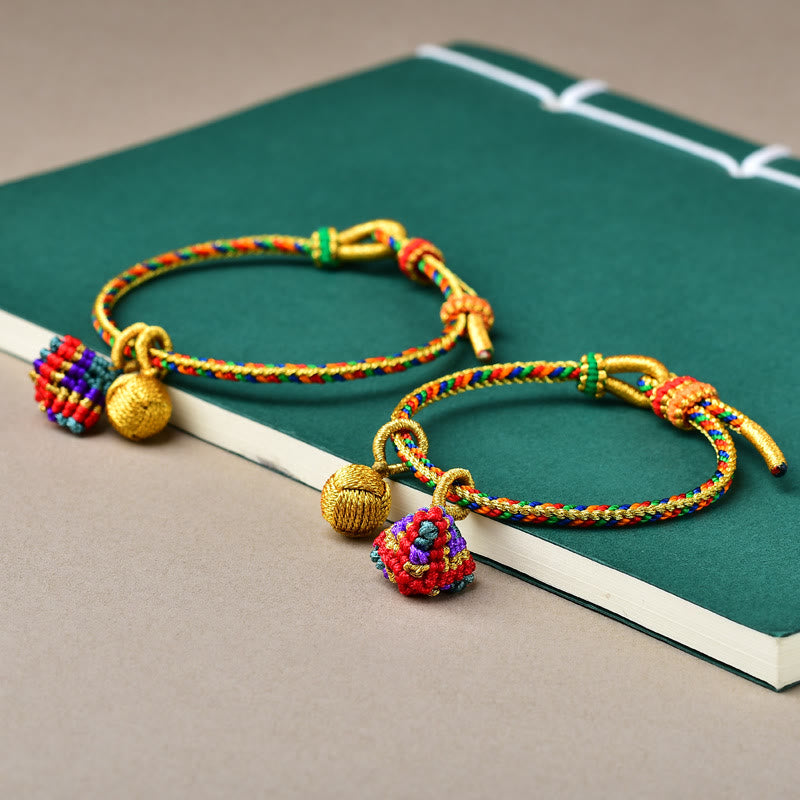 Pulsera con dije de bola dorada Zongzi hecha a mano con cuerda colorida y Buddha Stones