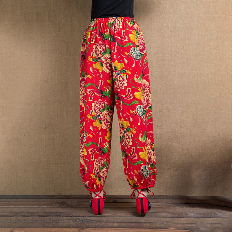 Pantalones bombachos con estampado de flores rojas y verdes de estilo étnico con Buddha Stones y bolsillos