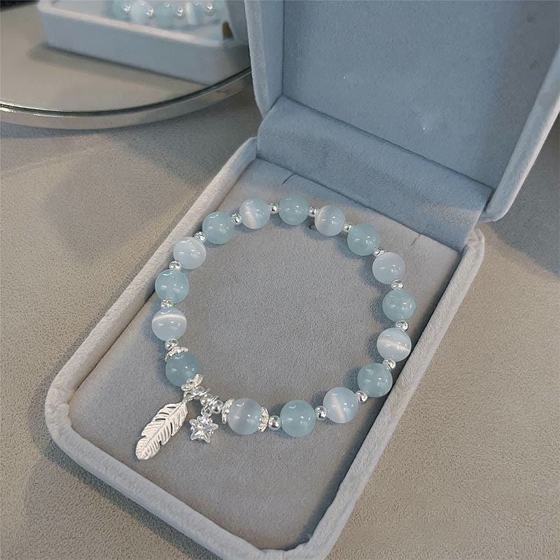Pulsera con dije de estrella y plumas curativas de ojo de gato, aguamarina, plata de ley 925 con Buddha Stones