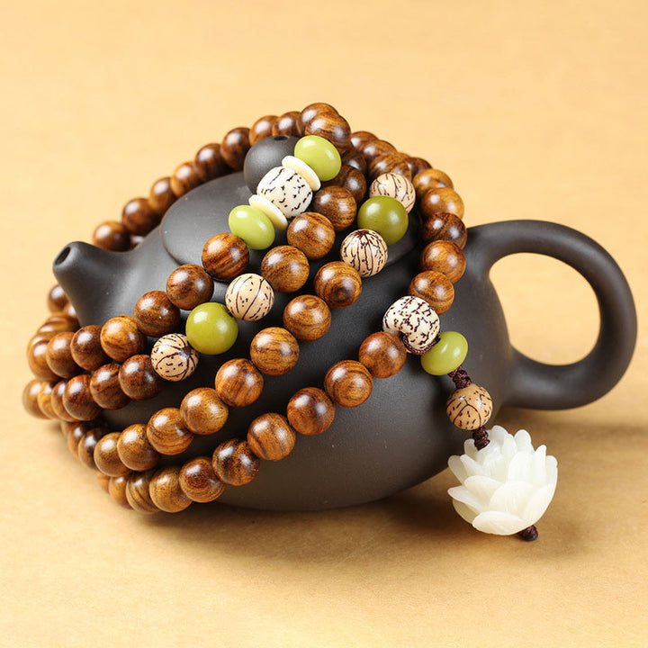 Buddha Stones Palo de rosa tibetano Loto Mala Protección Calma Collar Pulsera