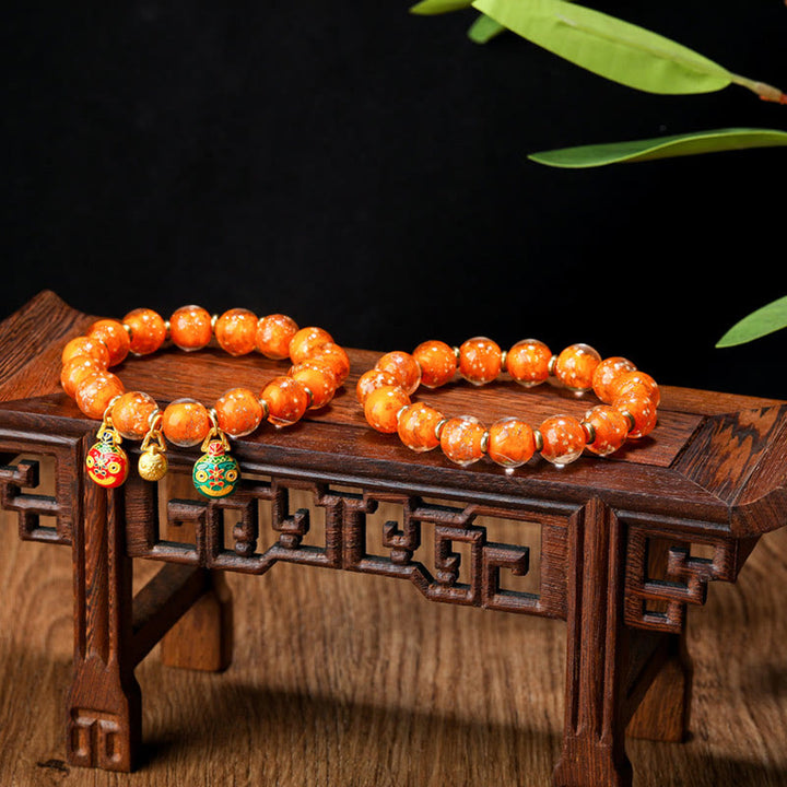 Pulsera de éxito con cuentas de cristal Liuli fluorescentes luminosas con abalorio familiar de bestia tragadora de oro con Buddha Stones