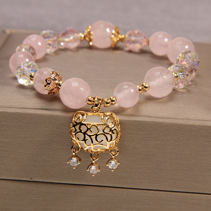 Pulsera de protección calmante de cristal rosa natural con Buddha Stones