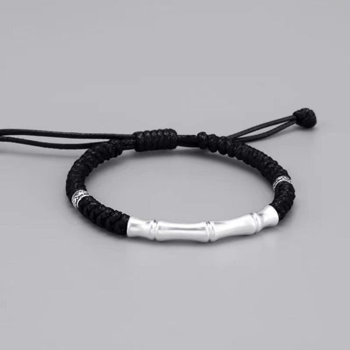 Pulsera trenzada de cuerda de la suerte con patrón de hueso de plata de ley 999 con Buddha Stones