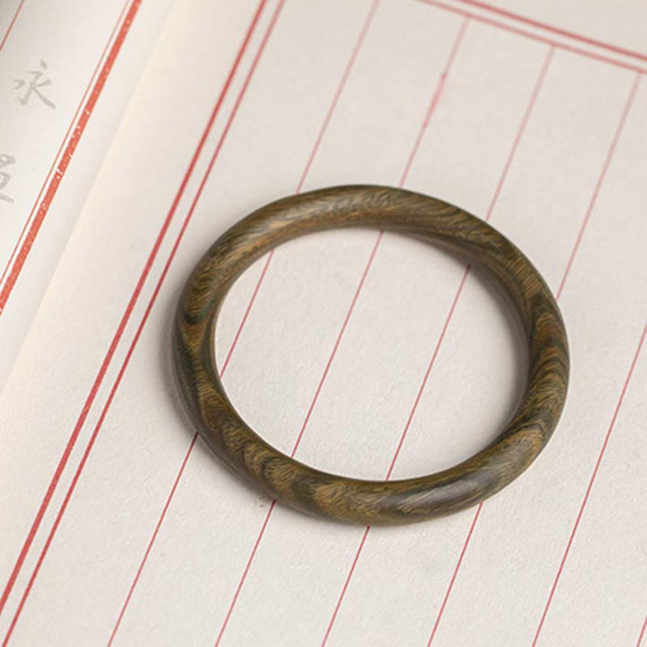 Brazalete de protección de sándalo verde de ébano rojo de hoja pequeña tibetana con Buddha Stones