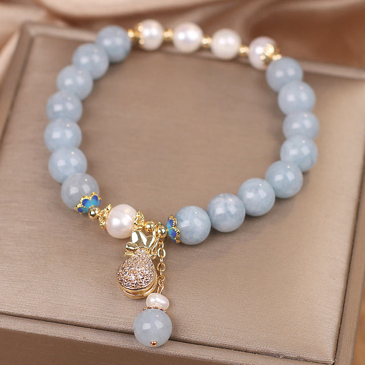 Pulsera con dije para bolsa de dinero con perlas de aguamarina y Buddha Stones