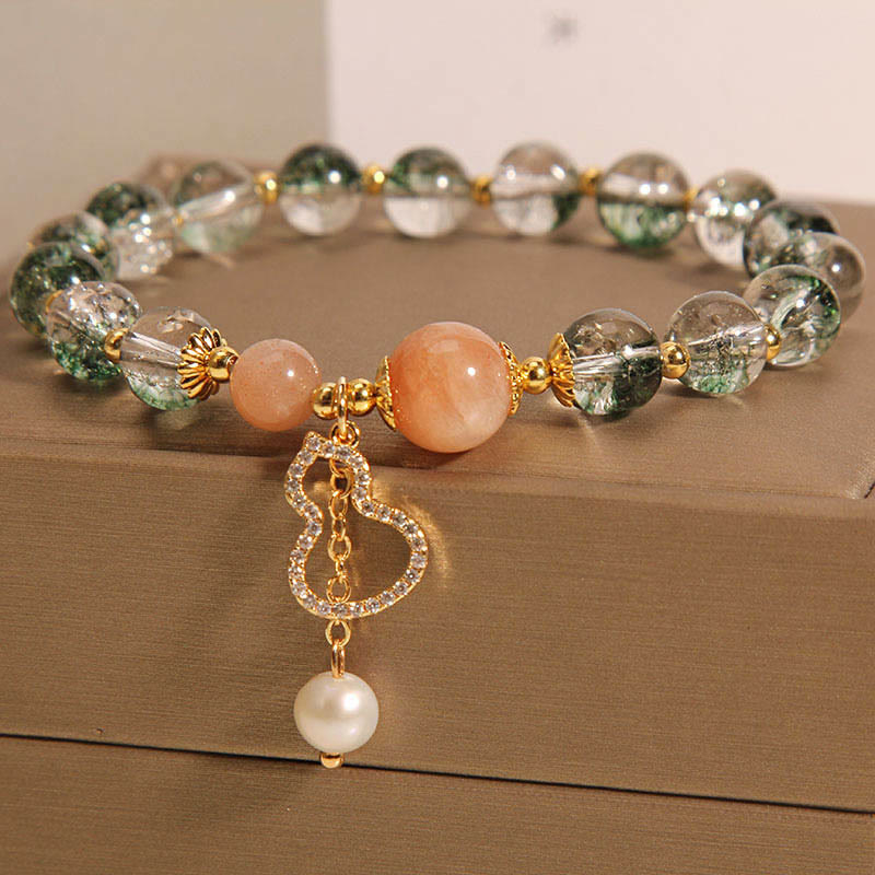Pulsera de confianza con dije de calabaza fantasma verde de Buddha Stones