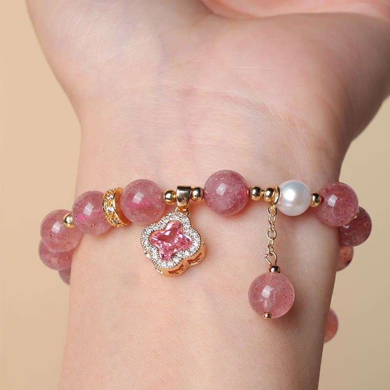 Pulsera curativa con dije de trébol de cuatro hojas y perlas de cuarzo fresa con Buddha Stones