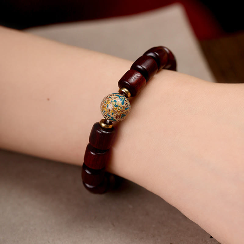 Pulsera de la paz con cuentas de laca de sándalo rojo de hoja pequeña de sándalo verde natural con Buddha Stones