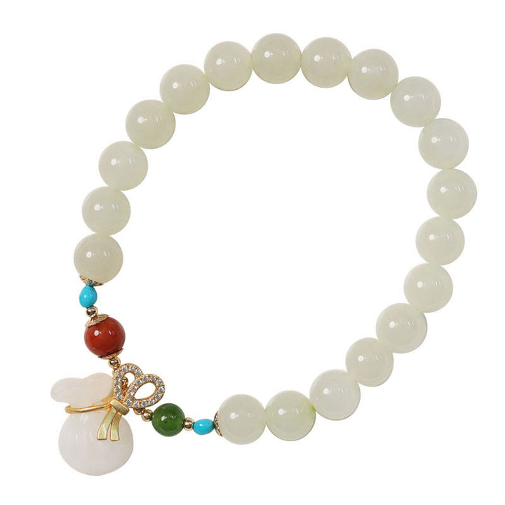 Pulsera de bendición para bolsa de dinero chapada en oro de 14 quilates con jade blanco hetiano natural con Buddha Stones