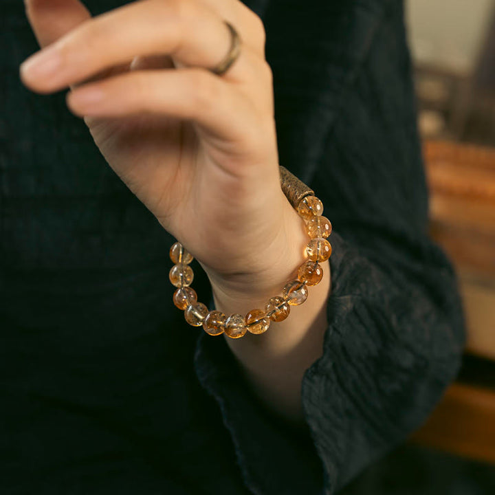 Pulsera de protección de cuentas de latón y cristal de citrino natural con piedras de Buddha Stones
