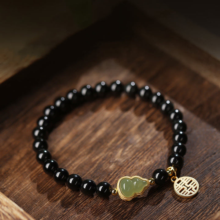 Pulsera de fuerza de doble felicidad con calabaza de jade hetiano de obsidiana negra natural