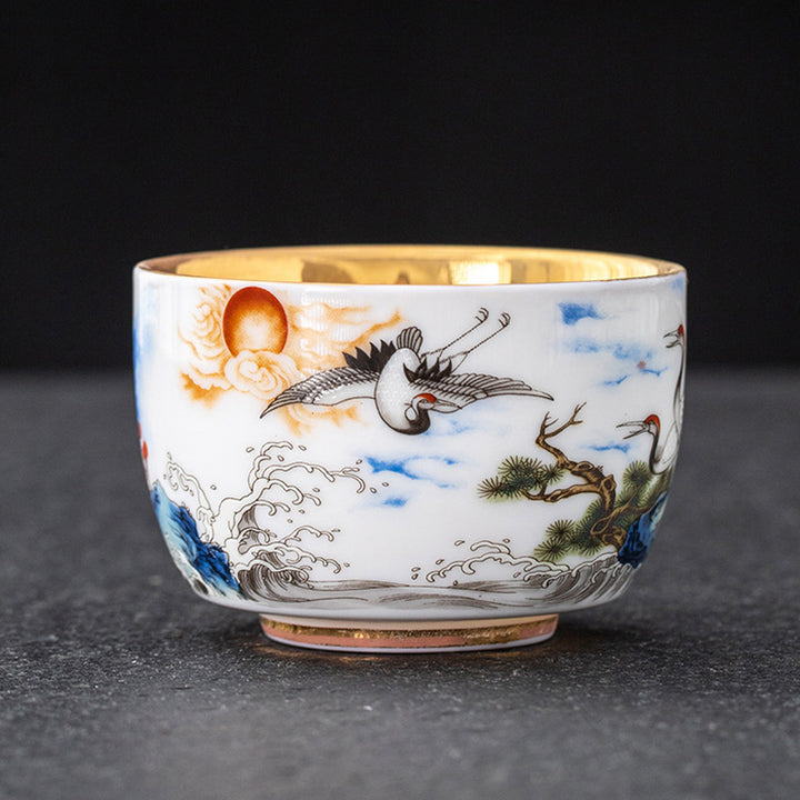 Buddha Stones Dragón Fénix Grulla Sol Océano Olas Taza de té de cerámica dorada Taza de té de Kung Fu 170 ml