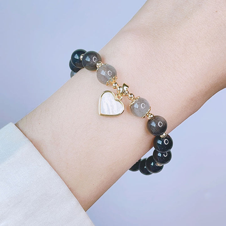 Pulsera de protección de flor de estrella de corazón de amor de obsidiana con brillo de plata natural de Buddha Stones