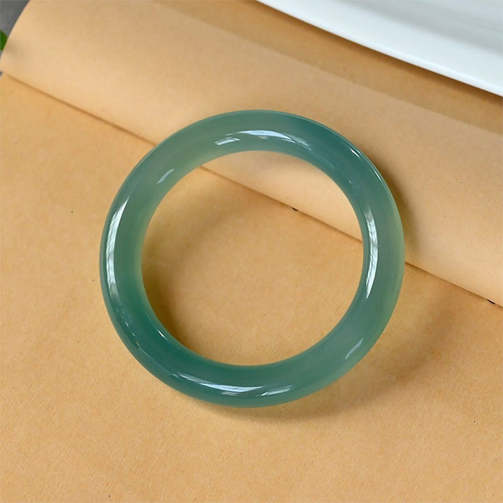 Brazalete de fuerza de calcedonia verde natural con Buddha Stones