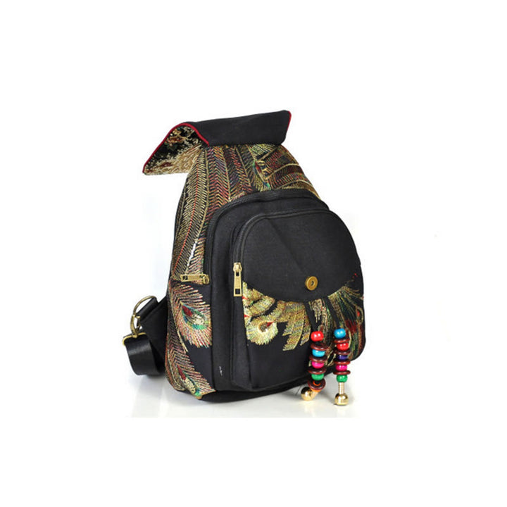 Mochila con borlas de lona con bordado de pavo real