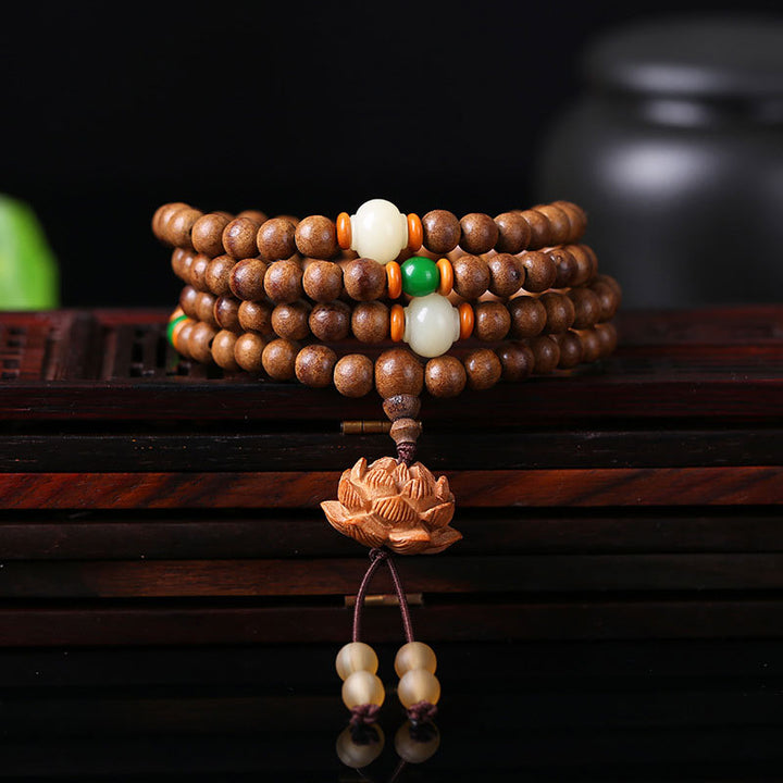 Buddha Stones 108 cuentas Mala madera de melocotón semilla Bodhi pulsera de meditación de oración de loto